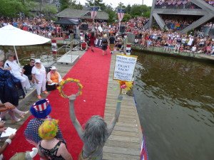 Neptune says no as he proceeds down the catwalk with a Boycott sign.