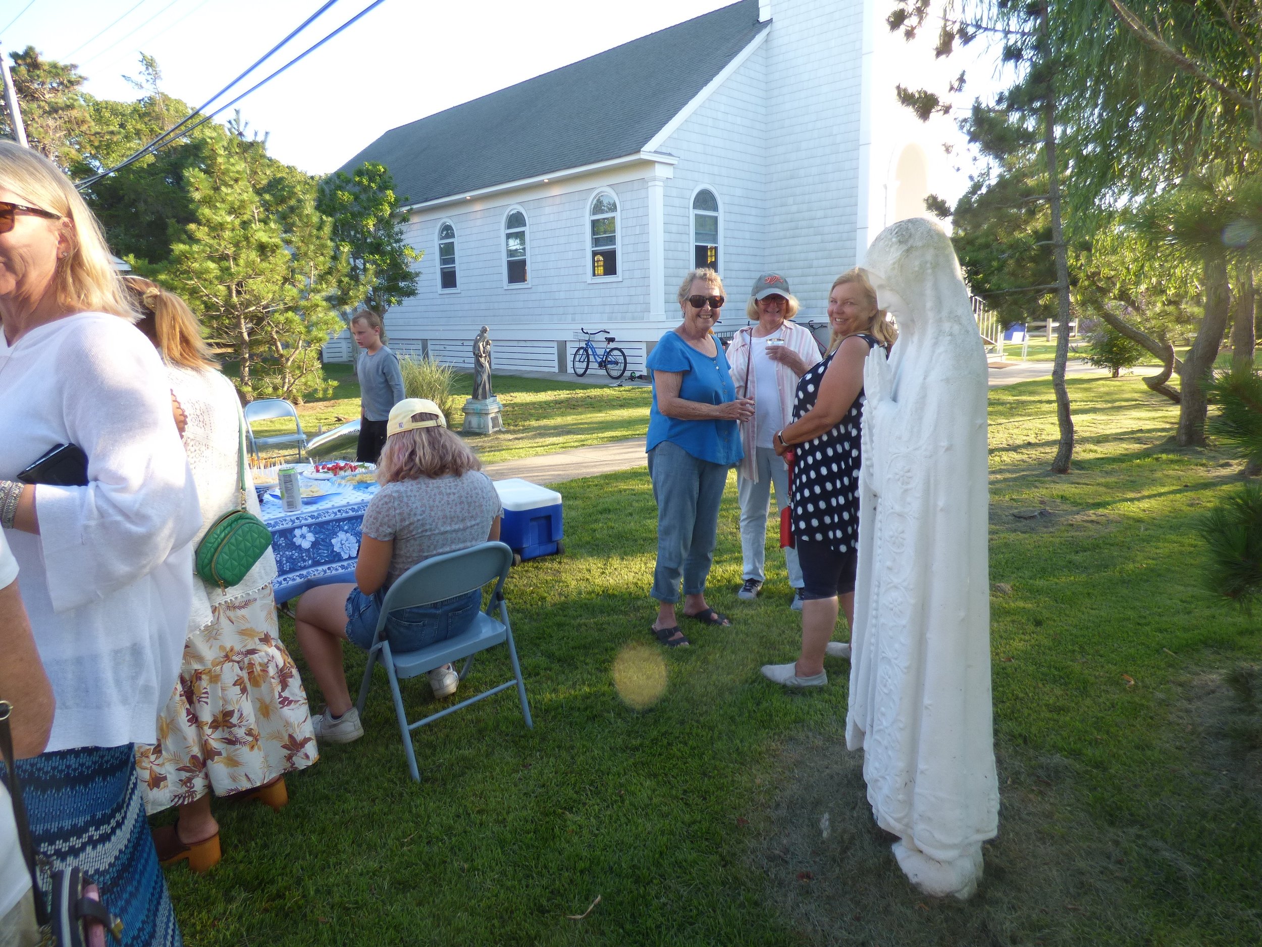 Ladies with the Lady on the church lawn.