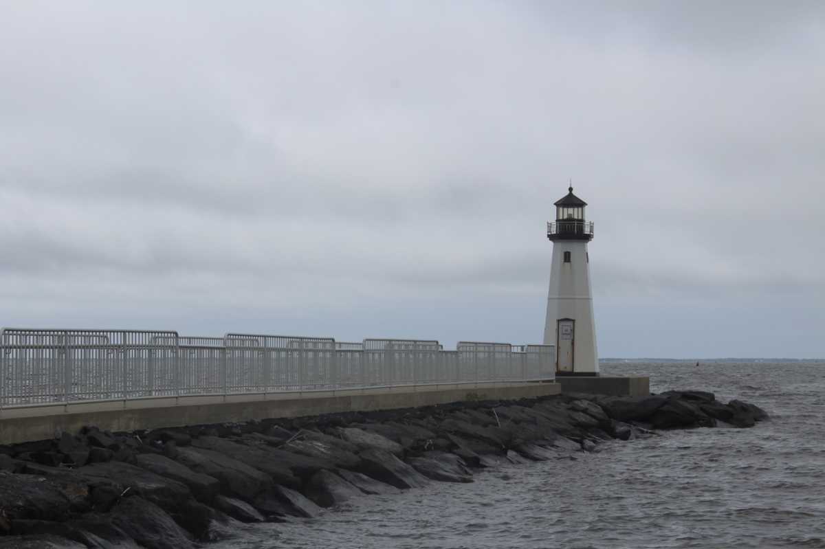 Patchogue’s Sandspit Lighthouse looks spiffy now, with a ramp and side railings so visitors and residents can meander and enjoy the view. However, most people are unaware of its long history of starts and stops. “The original one was a WPA project along with the rock pile,” said Matt Sherman, owner of the Davis Park Ferry Company, along with his sister-in-law Stephanie Sherman. (The WPA—Works Progress Administration—was a New Deal agency established in 1935 by President Franklin D. Roosevelt during the Great Depression. It employed millions of people who were out of work.)