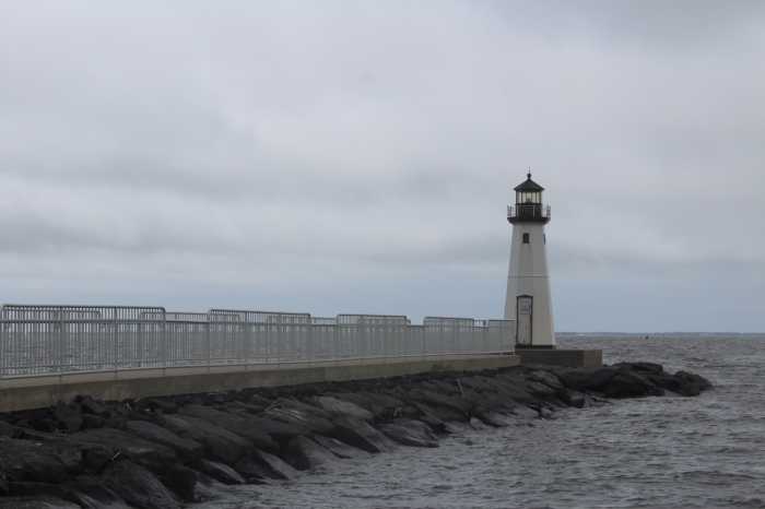 Patchogue’s Sandspit Lighthouse looks spiffy now, with a ramp and side railings so visitors and residents can meander and enjoy the view. However, most people are unaware of its long history of starts and stops. “The original one was a WPA project along with the rock pile,” said Matt Sherman, owner of the Davis Park Ferry Company, along with his sister-in-law Stephanie Sherman. (The WPA—Works Progress Administration—was a New Deal agency established in 1935 by President Franklin D. Roosevelt during the Great Depression. It employed millions of people who were out of work.)