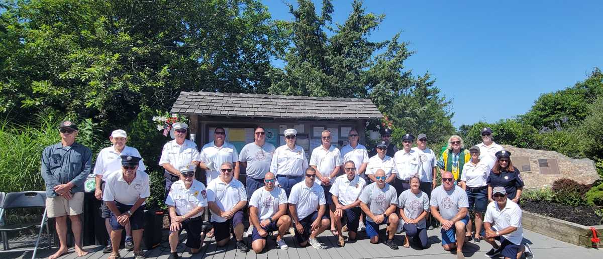 Weekends are always shorter at the beach; fortunately, our memories are long. That was in evidence at the Davis Park Fire Department's Rock Memorial Ceremony, held annually to commemorate members who had answered their last alarm. Following a blessing by Father Frank, Chief Craig Beane read the names of those who served, including our own dearly departed, as gathered family and friends quietly shared stories.  Please support the Department in their fundraising efforts with a 400 Club Raffle Ticket. You can also inquire about signage for the beautiful new pergola outside the firehouse.