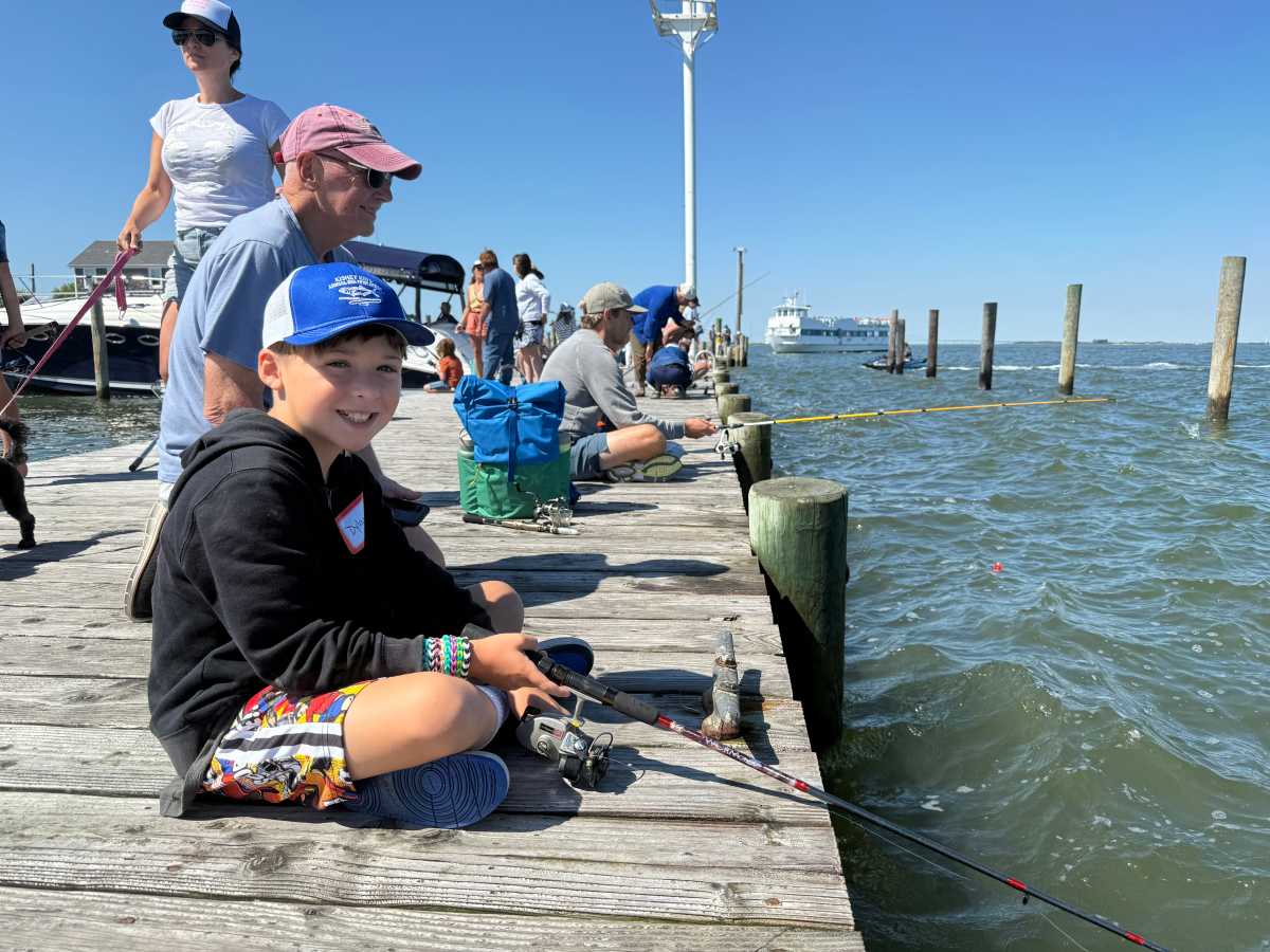 The Kismet Kids Snapper Derby was a big success on August 22, despite the wet weather brought by Hurricane Erin. The rain date was used, pushing everything back by only 24 hours. Fifty-eight children participated. While only two fish were caught on derby day, raffle sponsors, West Marine, the Boatel, Bar Aquatic, Nalu, and beach balls donated by the Agency made all the kids feel like winners. Congratulations to Adam for catching the first-place fish, and Nicholas for second place. The Kismet Inn provided the celebration lunch of hot dogs and fries, and the Kismet Market contributed ice pops.