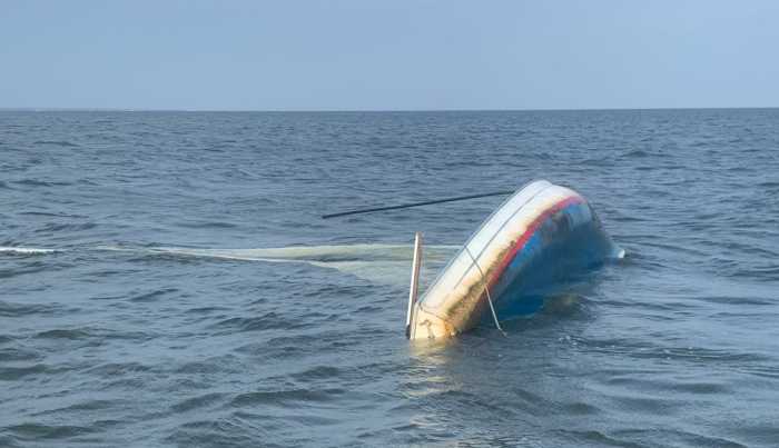 Suffolk County Police Marine Bureau officers rescued two individuals from the Great South Bay on Sunday evening, one mile south of East Islip Marina.
