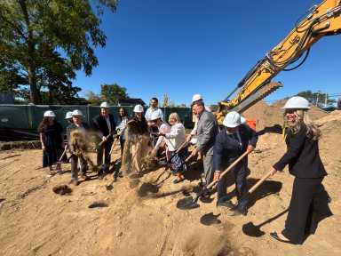 One Carleton Green, located in Central Islip, is a transformative, mixed-use, mixed-income, multifamily development with supportive units, situated at 1 Carleton Avenue in Central Islip, Suffolk County.