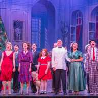 On Sundays in 1962, television host Chuck McCann, would read the New York Sunday News, which featured the cartoon character Little Orphan Annie. He wore white circular discs over his eyes to portray Annie as he read the comic strip aloud. Such an oddity to me back then, those discs affixed to the eyes scared me. It even led me to dislike the Little Orphan Annie comic strip. However, seeing the production of Annie at the Argyle Theatre, directed by Valerie Wright, completely changed my mindset.