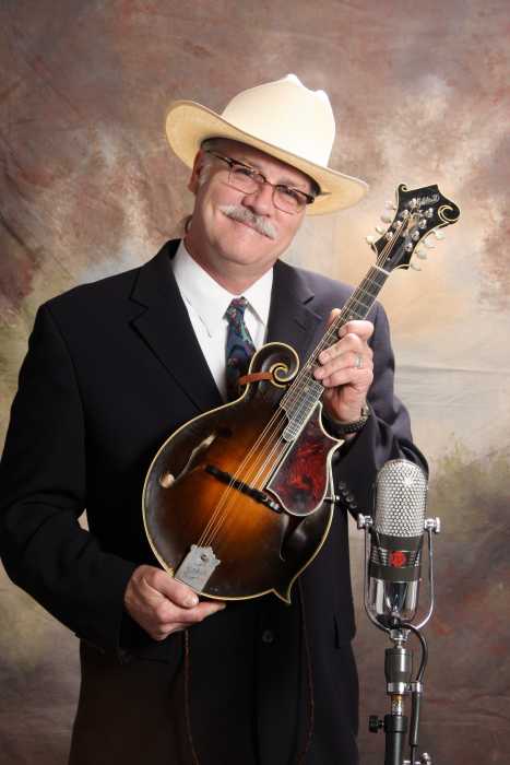 Bluegrass music may originate in the Appalachian Mountains, but it has made a home on Long Island for the past 50 years, despite its rural beginnings, thanks to Buddy Merriam.