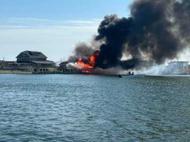 The structural blaze on Fire Island that consumed a bayfront house and seriously damaged another on Friday afternoon, April 24, caught regional attention, with black smoke visible for miles along and across the bay, and news station helicopters circling above Ocean Beach long after the smoke had cleared.