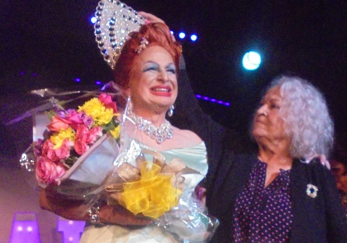 Our hectic summer schedule has begun. The Arts Project of Cherry Grove (APCG) kicked off the season with its opening-season party, featuring four exceptionally smart and talented contestants who ran for Homecoming Queen: Champagne Bubbles, Ivy Stalls, Violet Tide, and Flagarina.