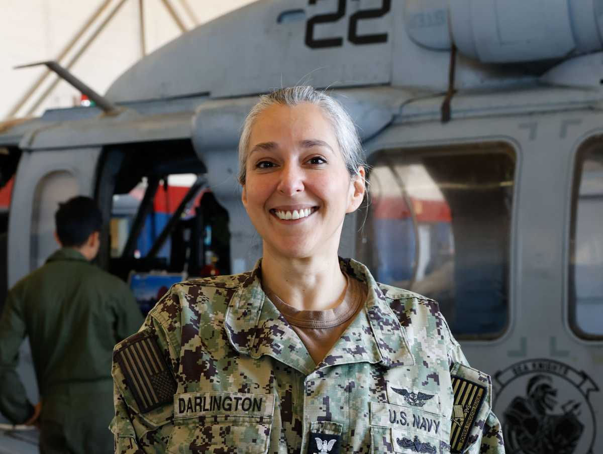 Petty Officer 1st Class Gabrielle Darlington continues an 18-year career in the U.S. Navy, serving with the "Sea Knights" of Helicopter Sea Combat Squadron 22 at Naval Station Norfolk, Virginia.