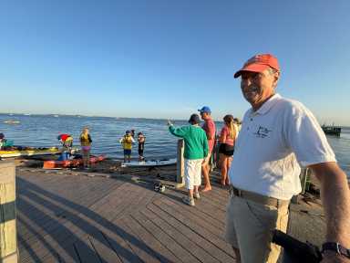 In 1927, five determined swimmers set out to swim across the Great South Bay. One hundred years later, the Maggie Fischer Memorial Cross Bay Swim is a nationally treasured event that has raised over a million dollars for the Hospice Care Network's Children and Family Bereavement Program and funds an annual scholarship at St. Anthony’s High School. The 5.6-mile trek from the Fire Island Lighthouse to Gilbert Park in Brightwaters is no easy feat — yet over 100 athletes conquer it every summer.